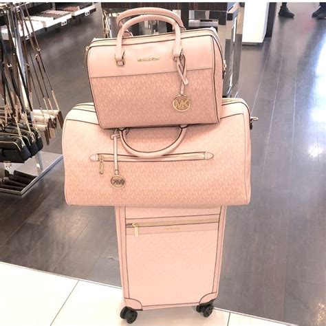 michael kors carry|Michael Kors pink suitcase.